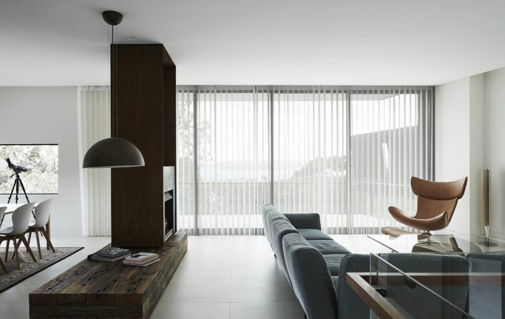 Off-white Veri Shade Blinds covering a floor-to-ceiling window in a modern home