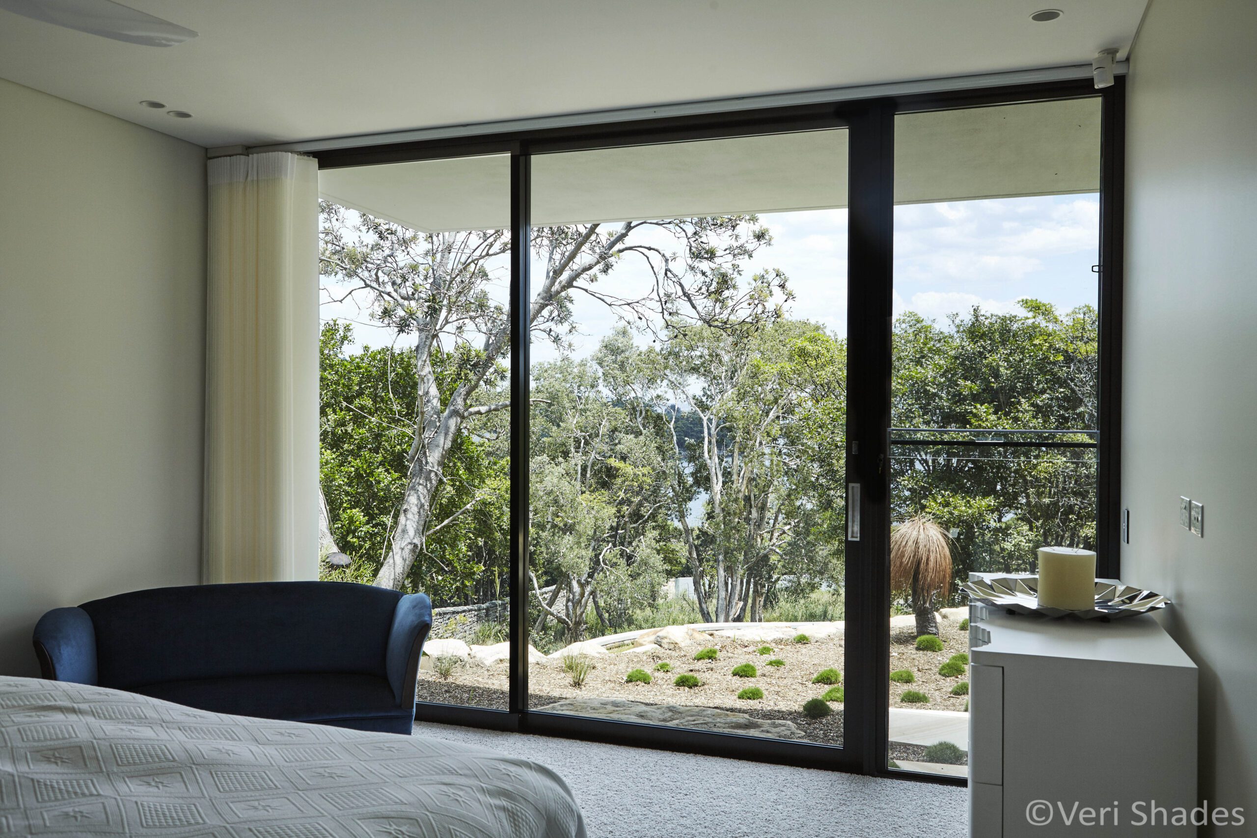 Off-white Veri Shade Blinds opened to the left hand side of the window, showing the outside view